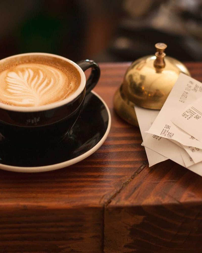 Latte art and counter details, café brand photography in Toronto