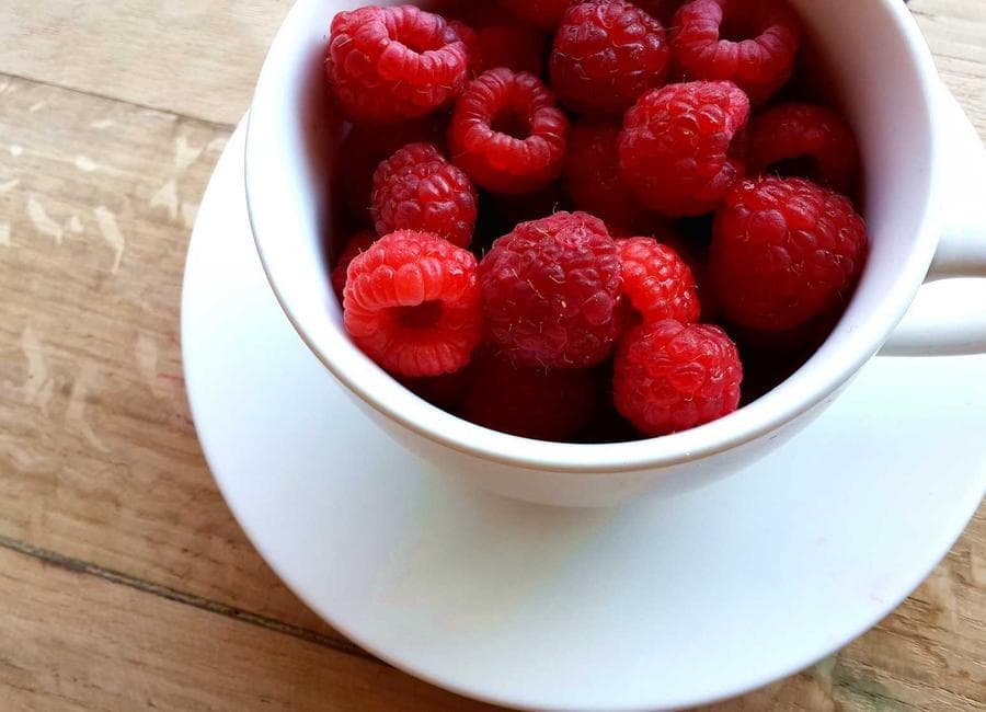 Raspberries in a bowl, food product photography