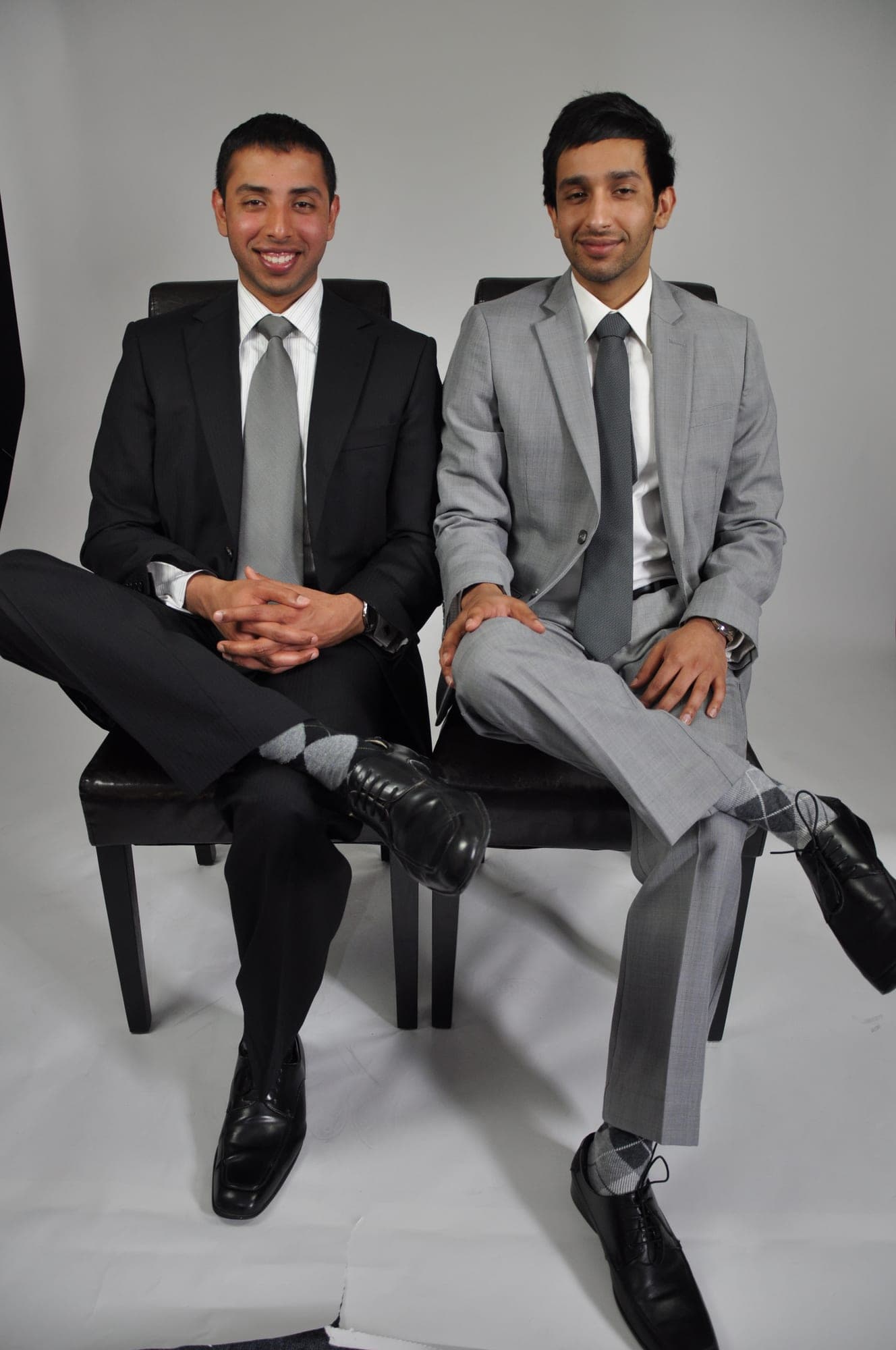 Two businessmen photographed together in a Toronto studio session